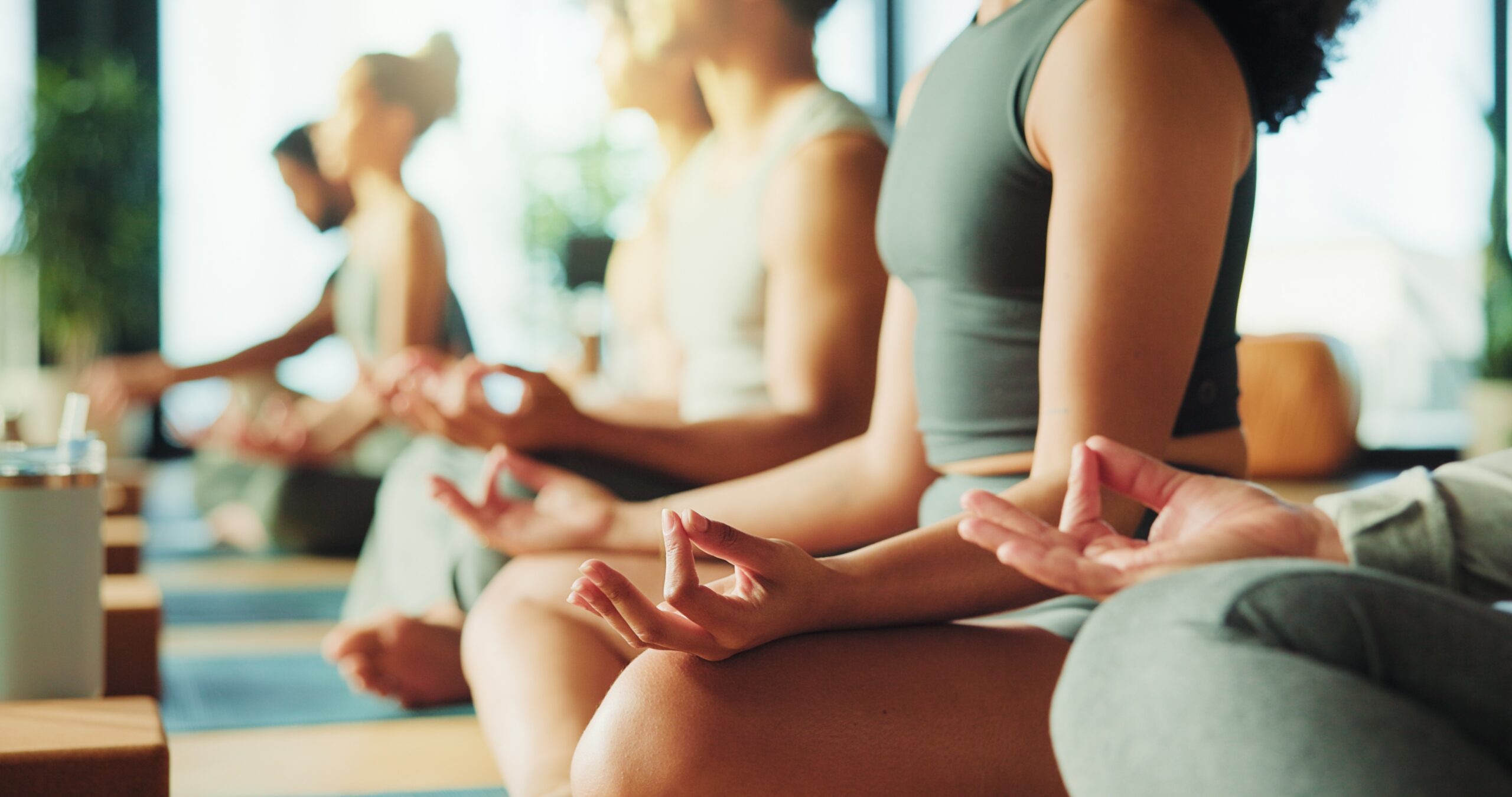 Women practicing meaningful meditation together.