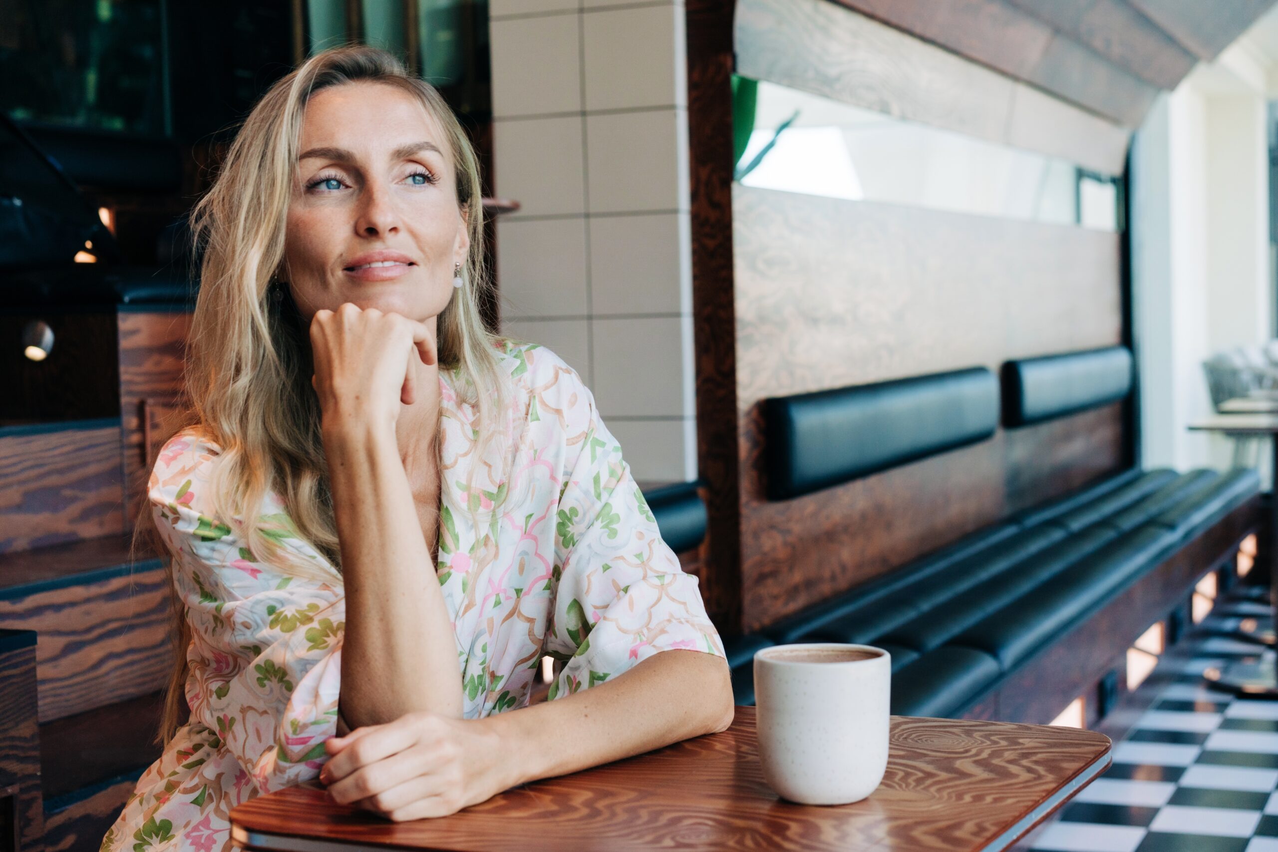 Mature woman sitting alone and enjoying her won company.