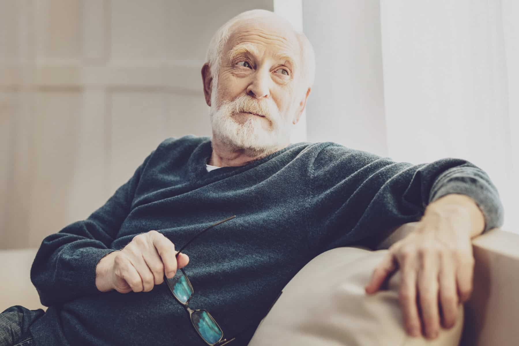 A Boomer parent waiting to have a conversation with his children about care taking.