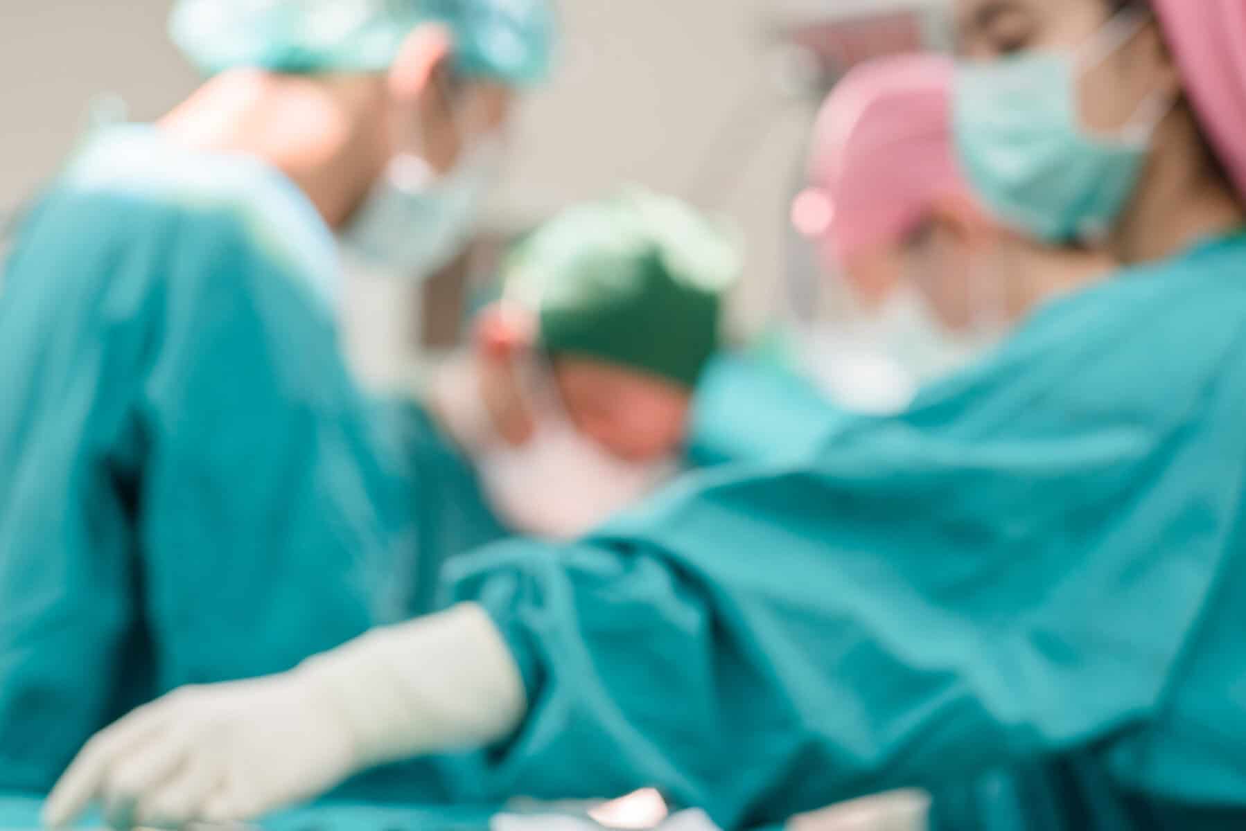 A medical team of surgeons in the hospital's operating room.
