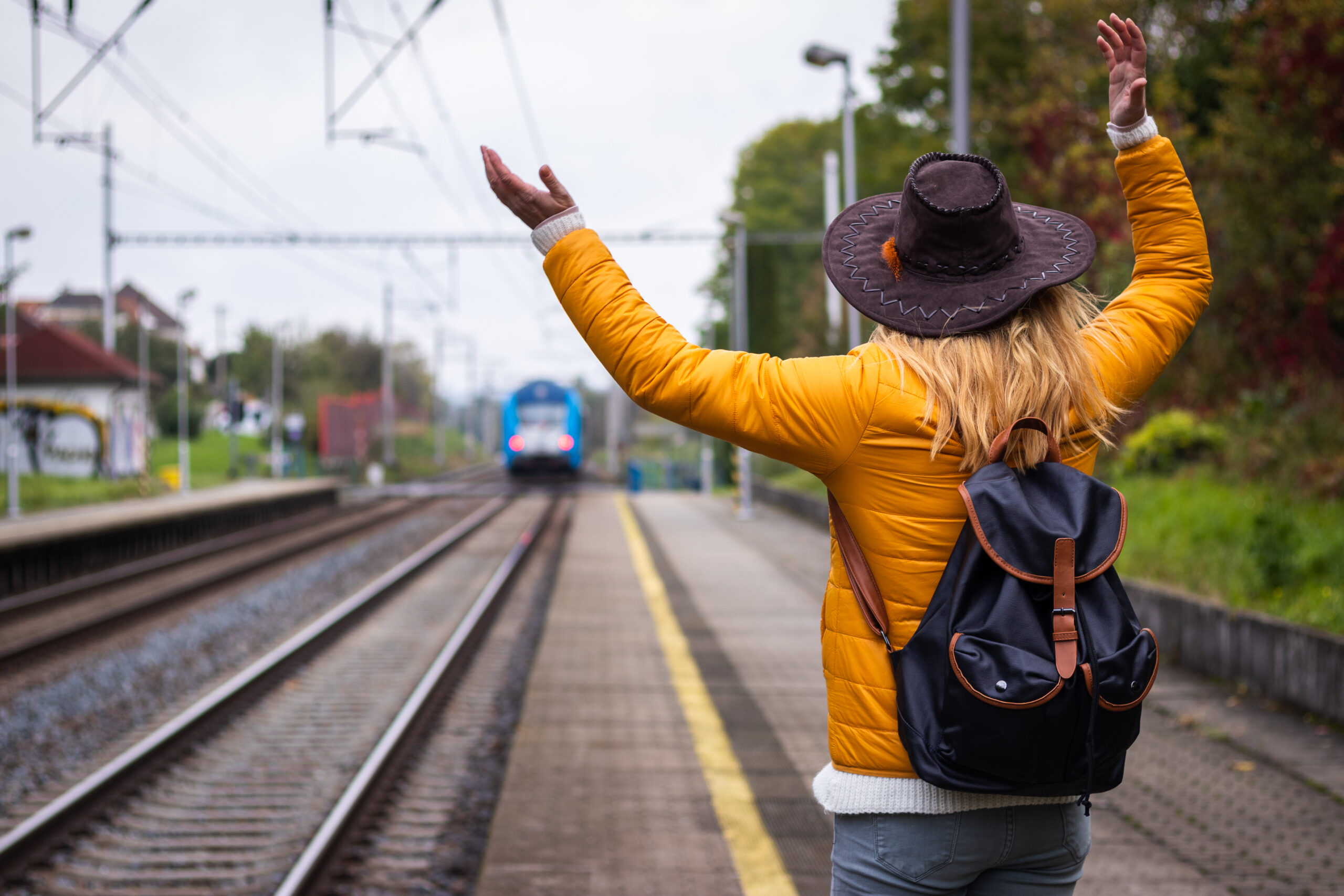 A woman realizing she has missed her train.