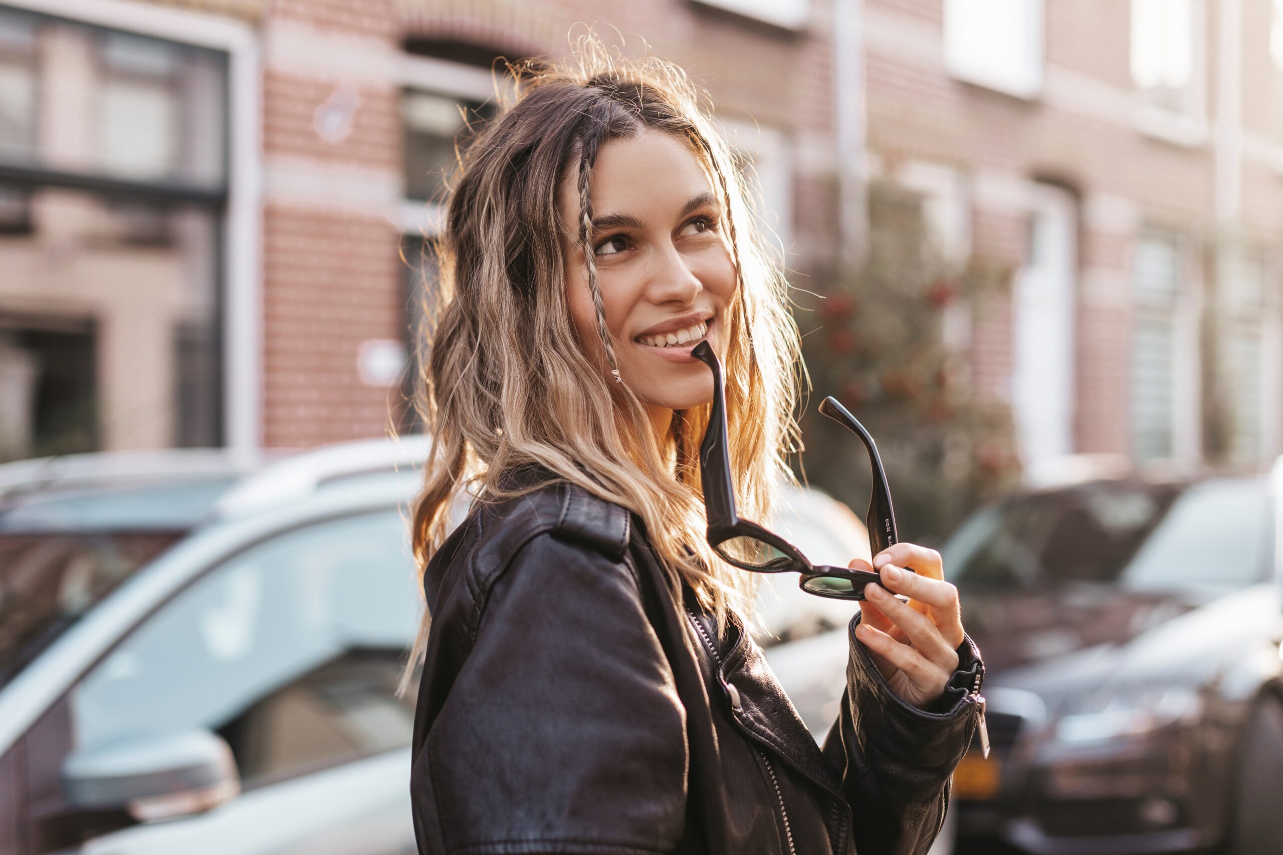 A warm woman with a smile on a walk.