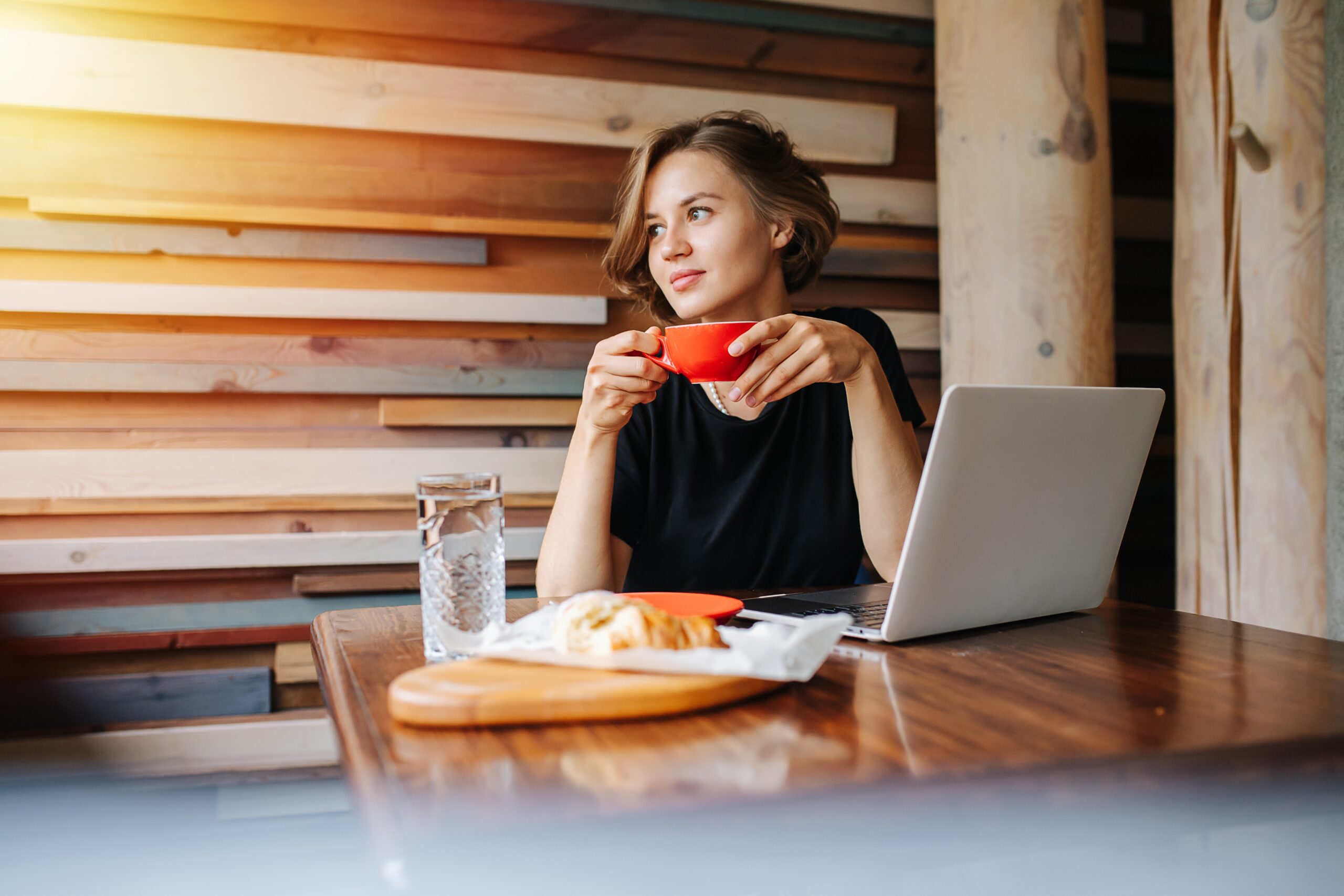 A friendly woman having lunch alone.