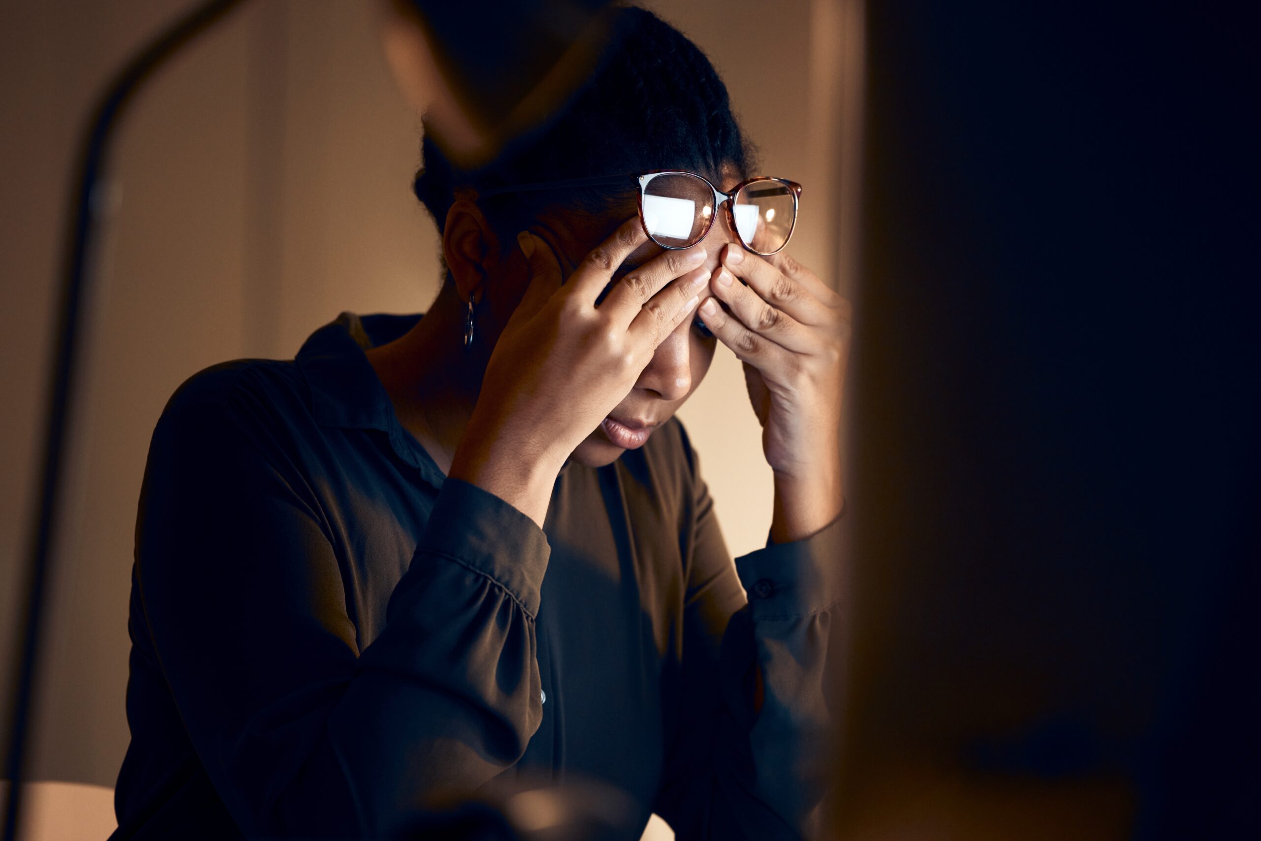A woman feeling overwhelmed with her responsibilities.