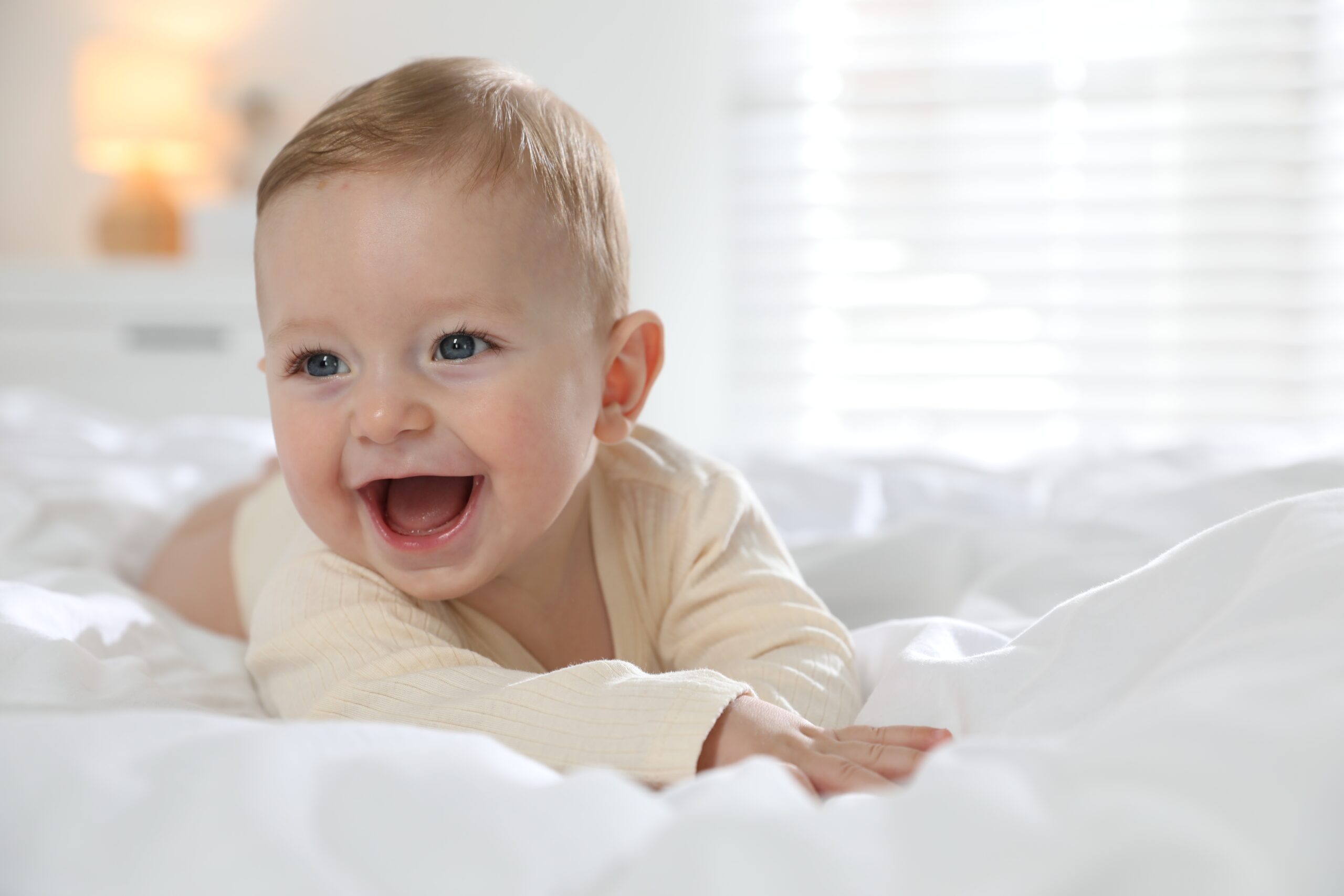 A beautiful little baby smiling.