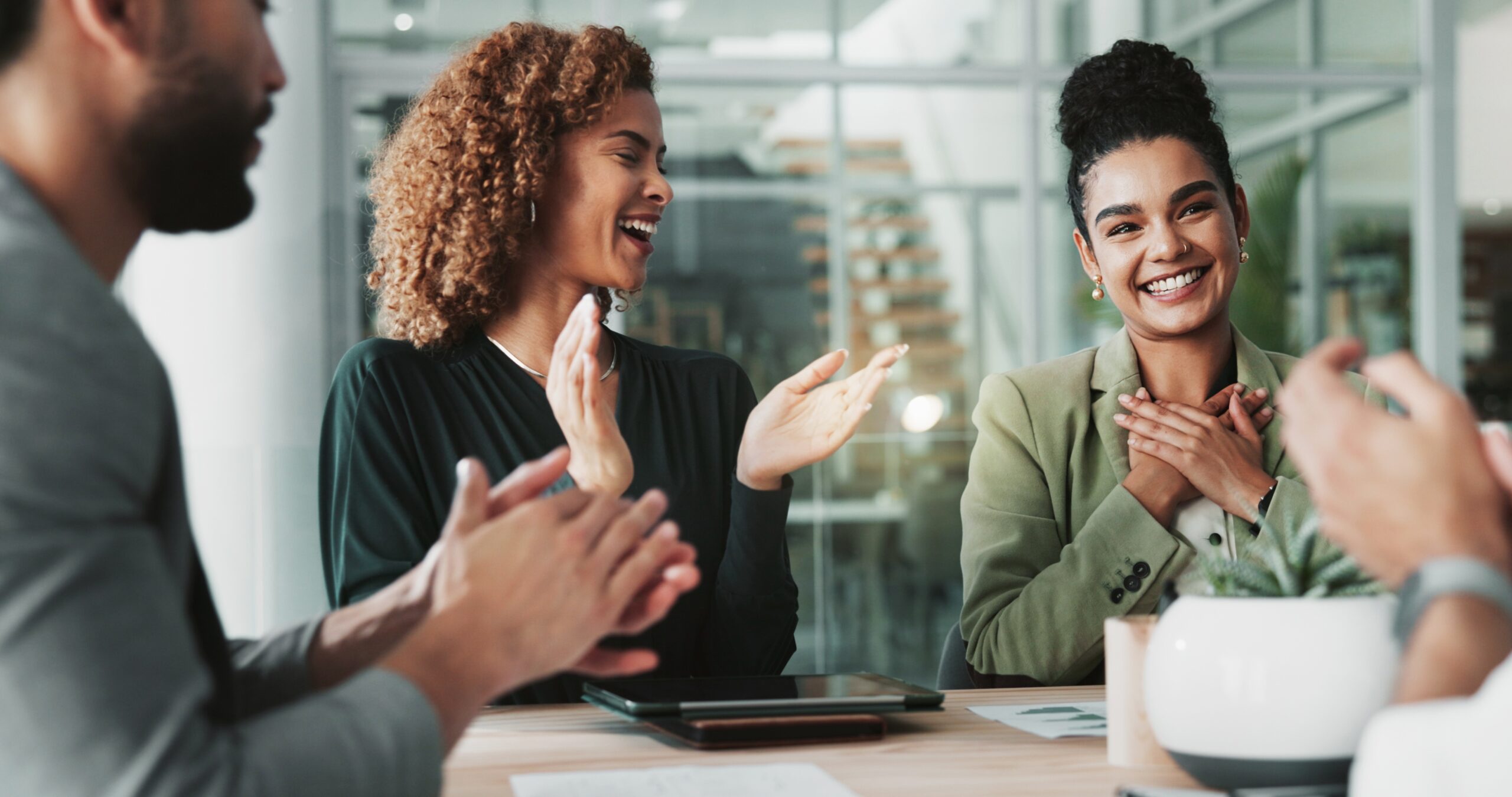 Colleagues giving a compliment to their coworker.
