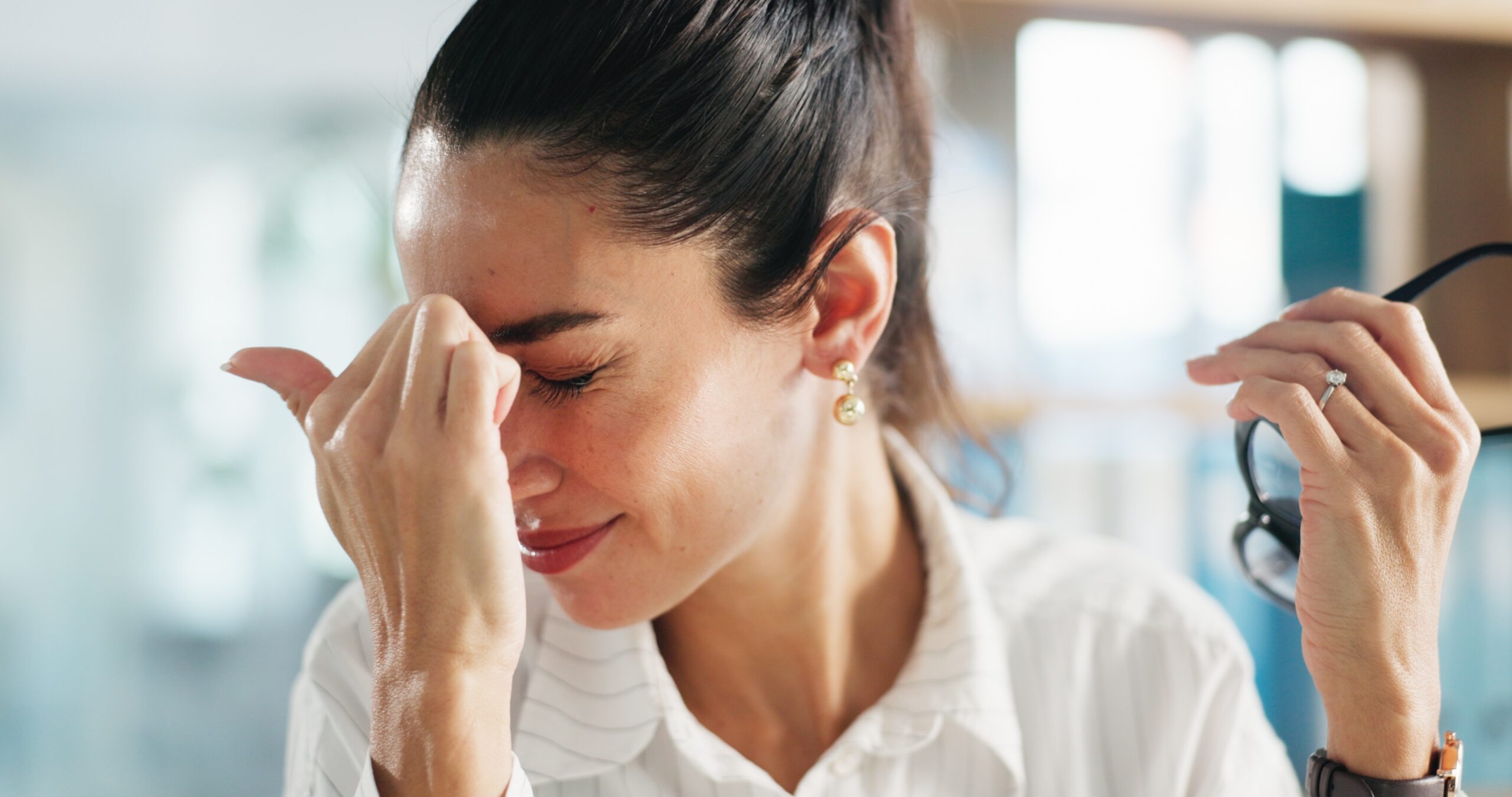 A woman with a tension headache.