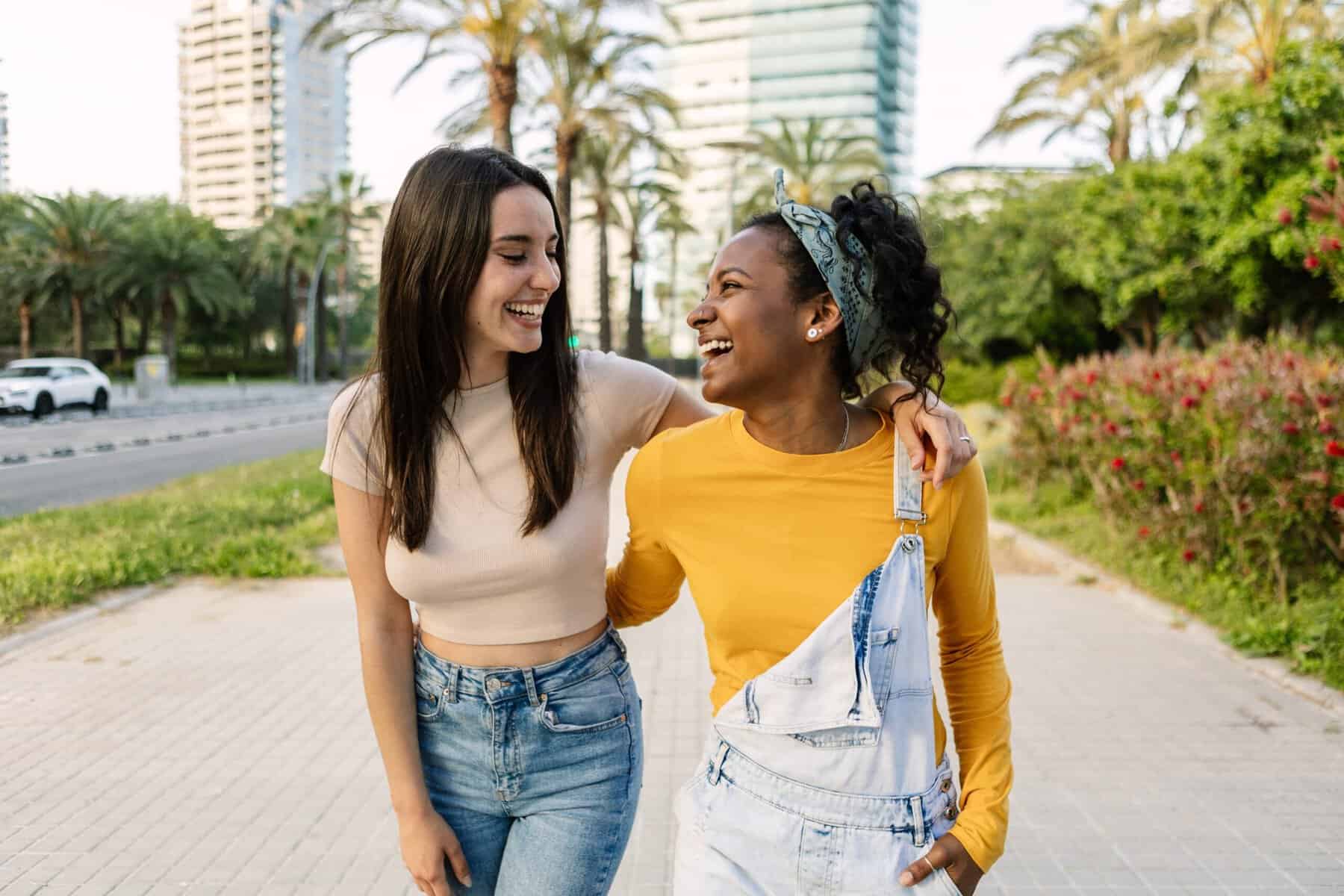 Two female friends having a walk and a talk.