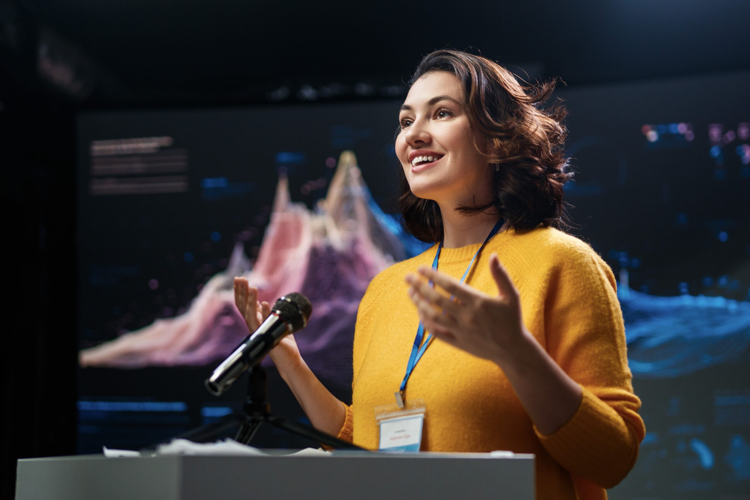 A woman giving a presentation at work.
