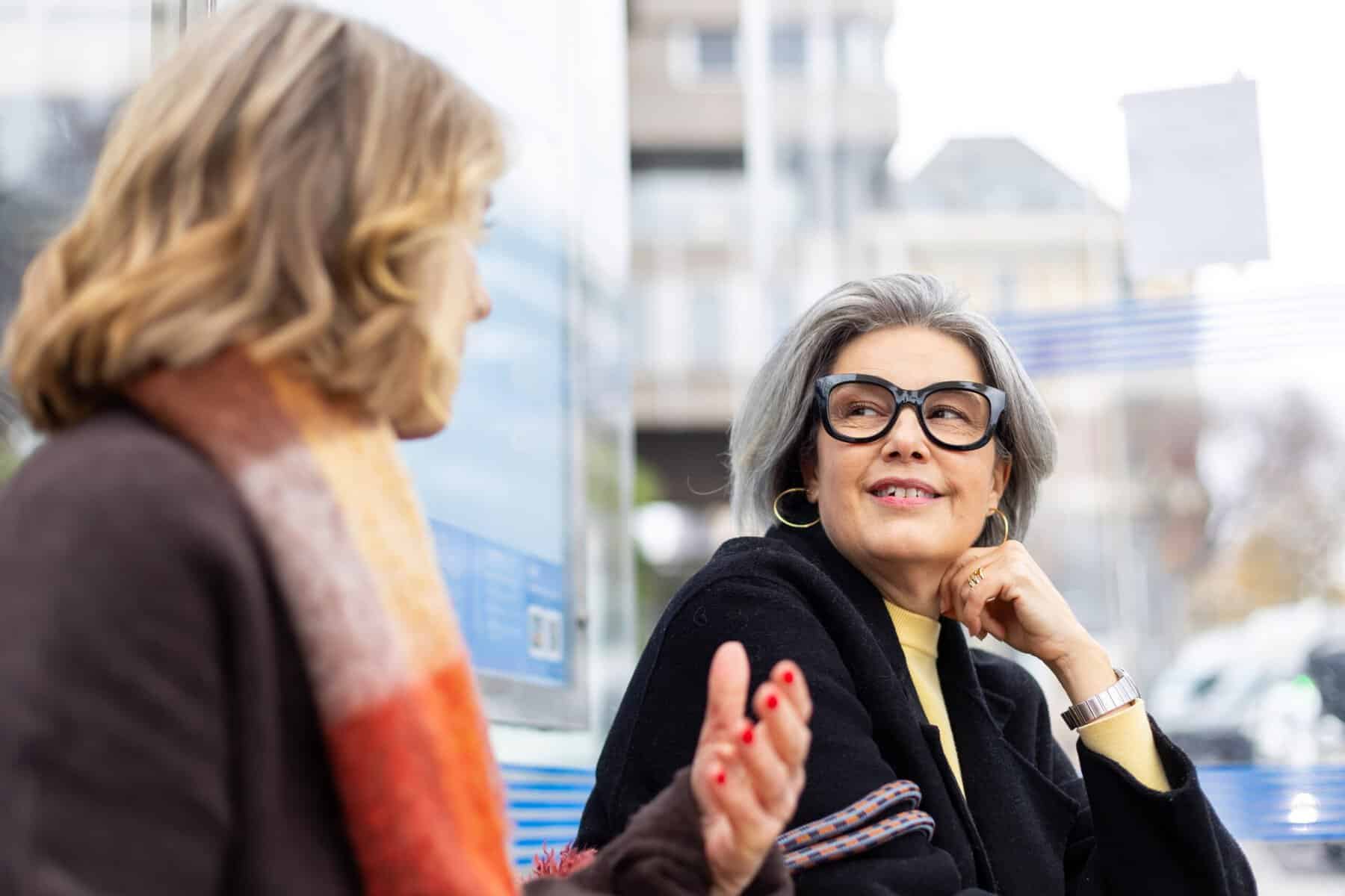 Two female friends having a serious discussion.