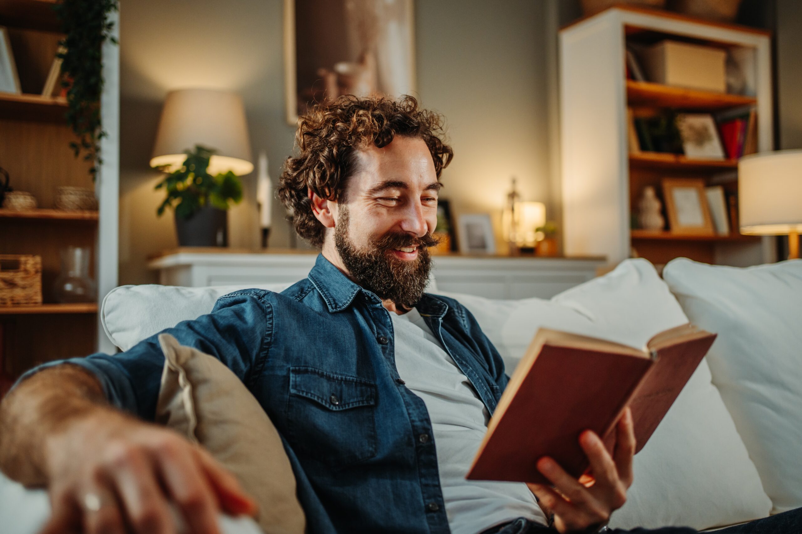 A man spending time alone and reading.