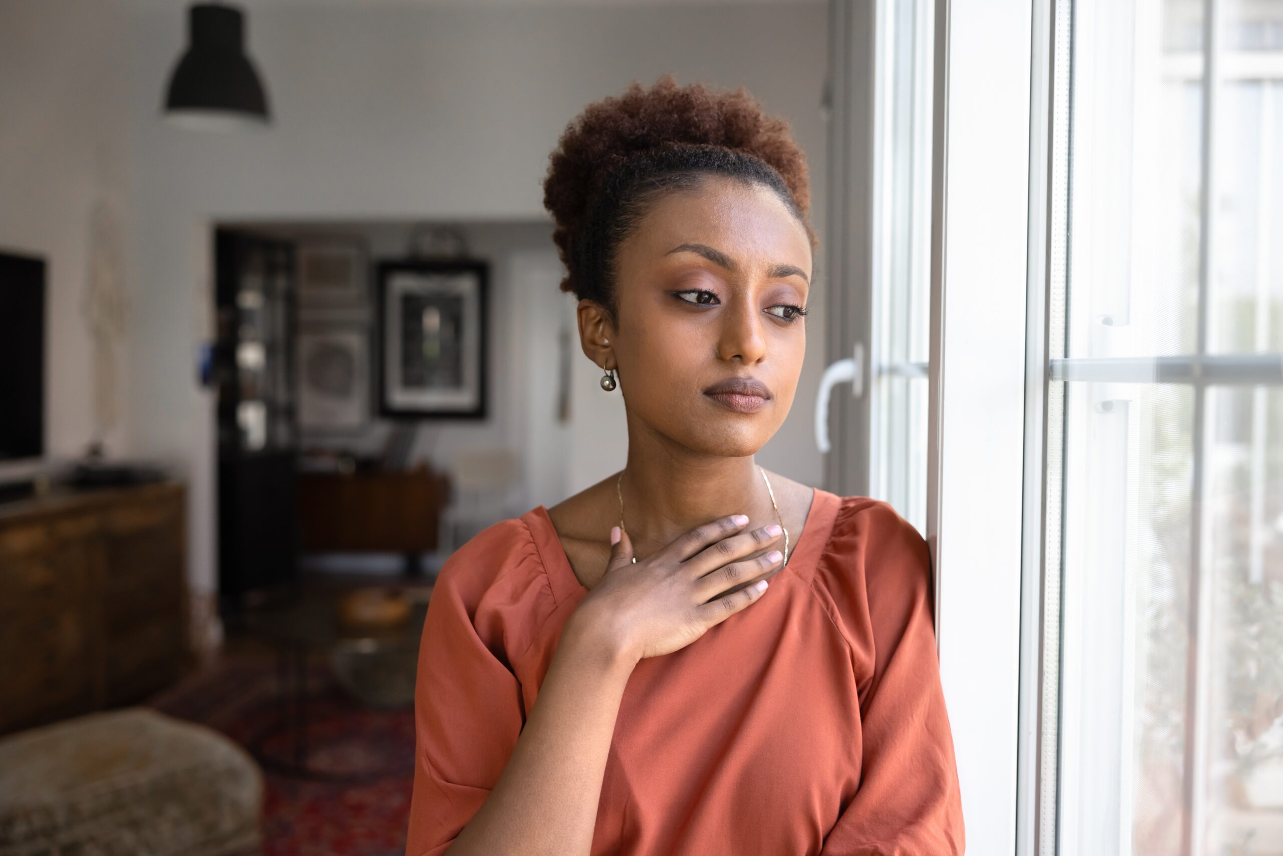 An independent woman alone at home.