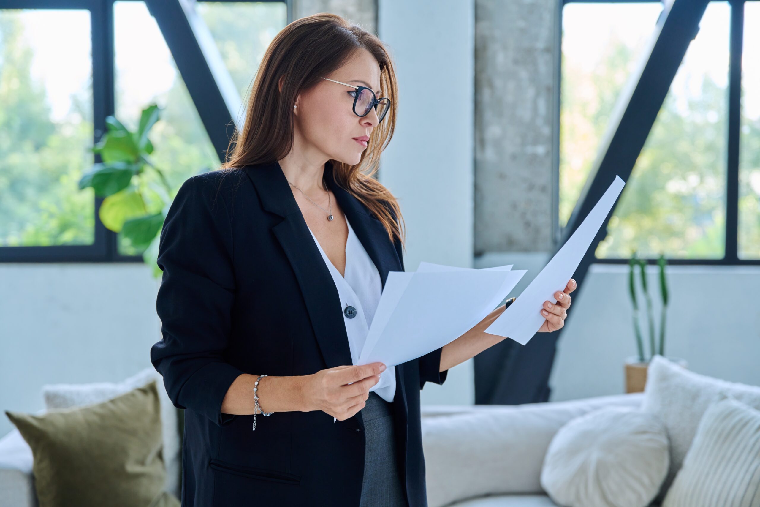 A confident female businesswoman in her office.