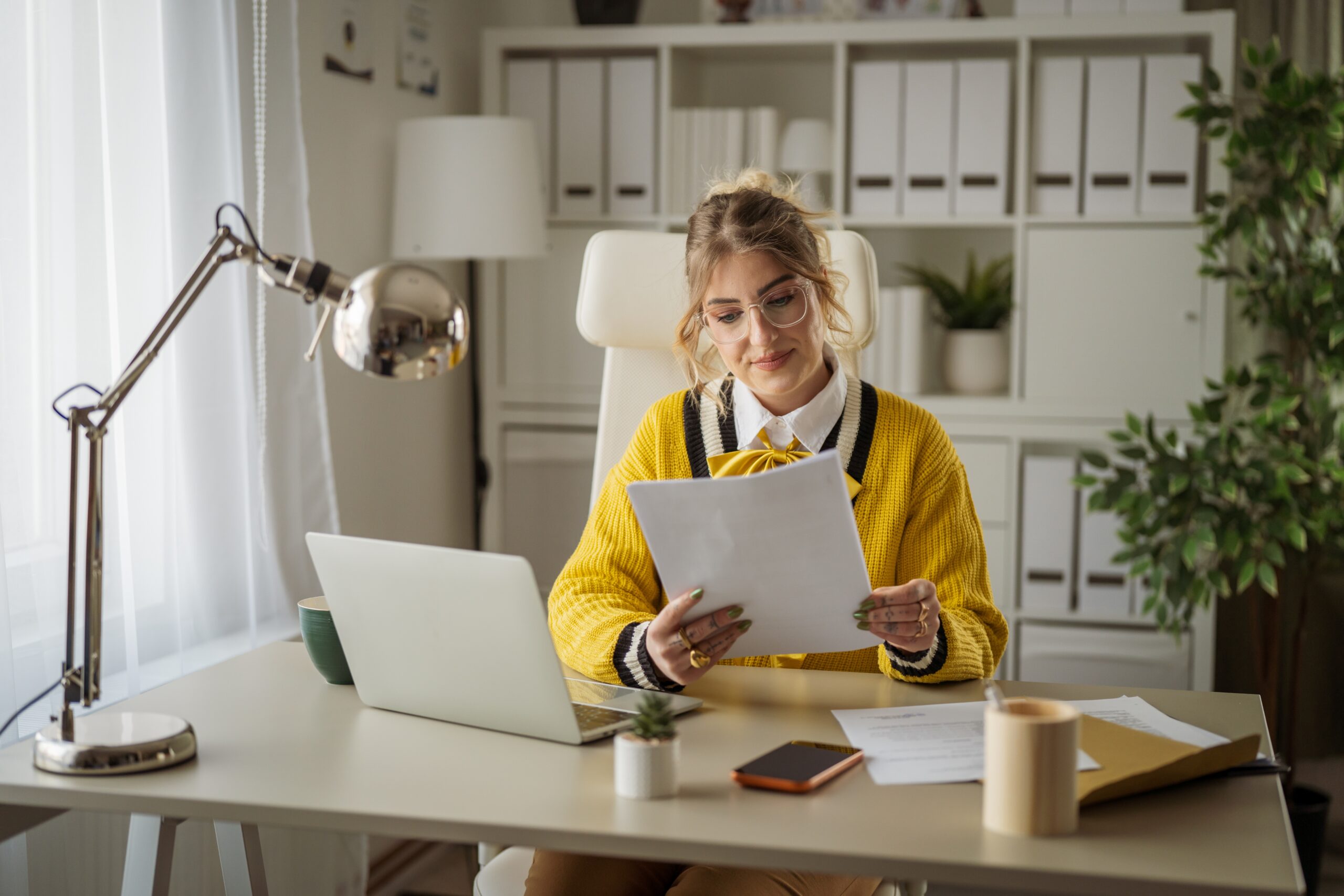 A strong independent woman at her desk.