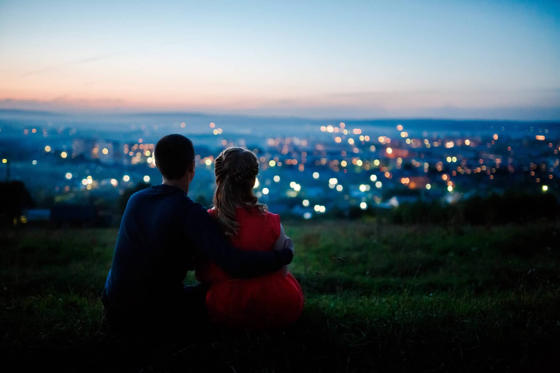 Two people on a date on a beautiful starry night.