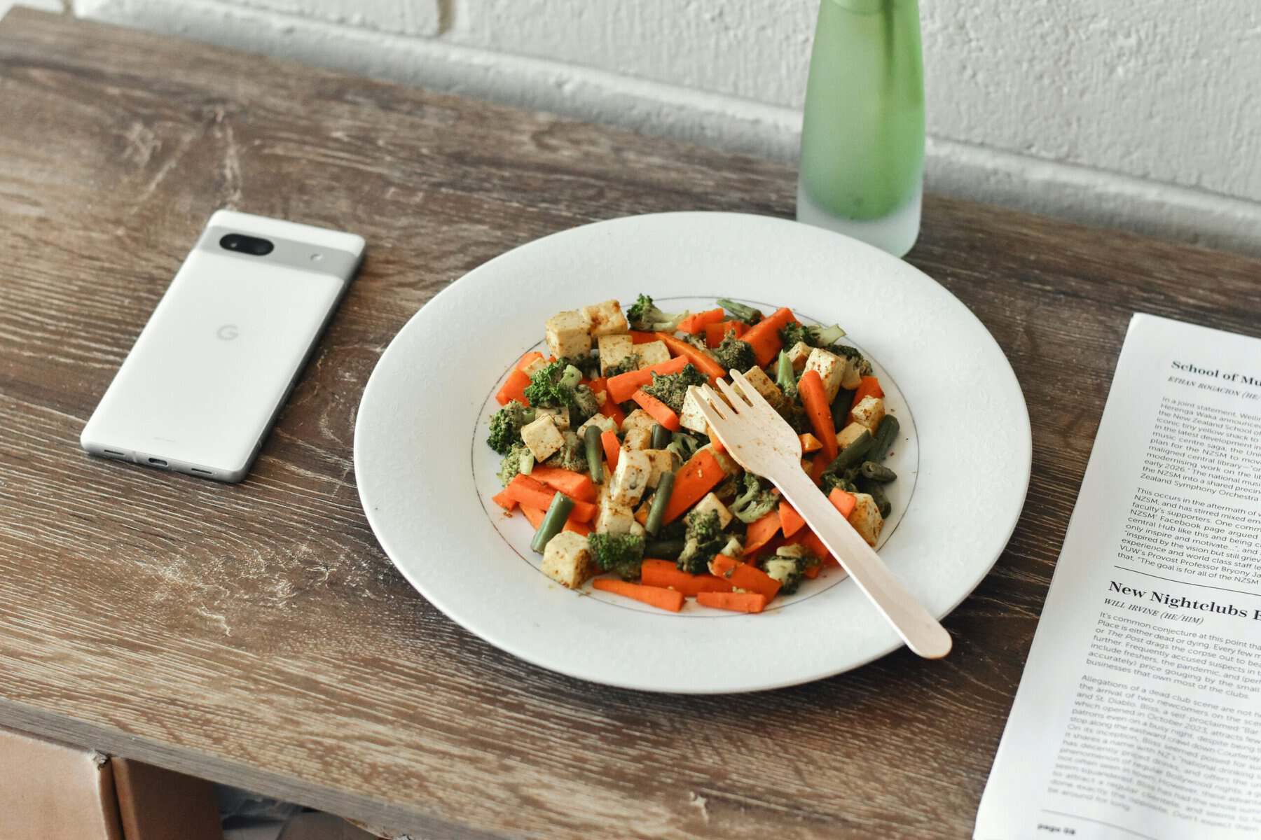 A phone face-down at lunch.
