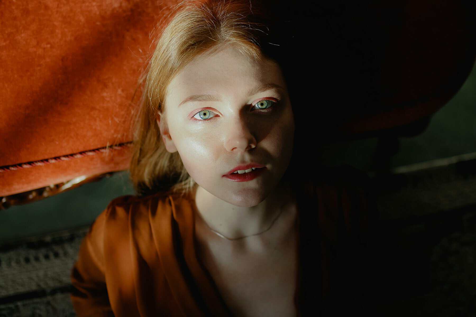 A person with fair skin and light eyes looking directly at the camera.