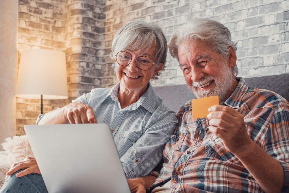 Older couple on the computer together.