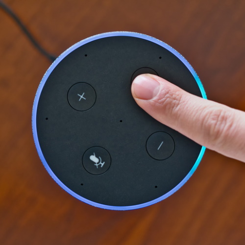 Smart speaker top view artificial intelligence assistant voice control blue ring finger