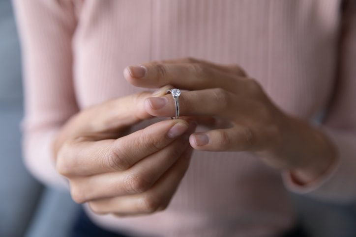 Woman touching her engagement ring