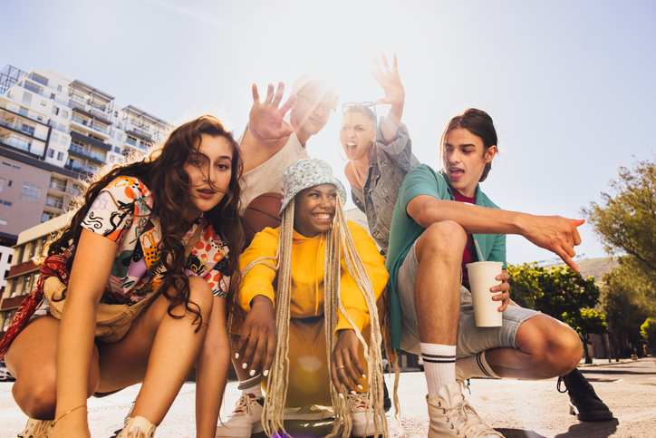 Vibrant young people having fun outdoors.