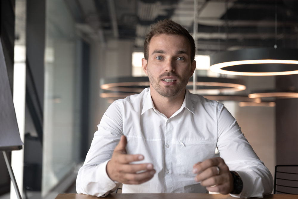 A businessman having a video conversation and communicating effectively