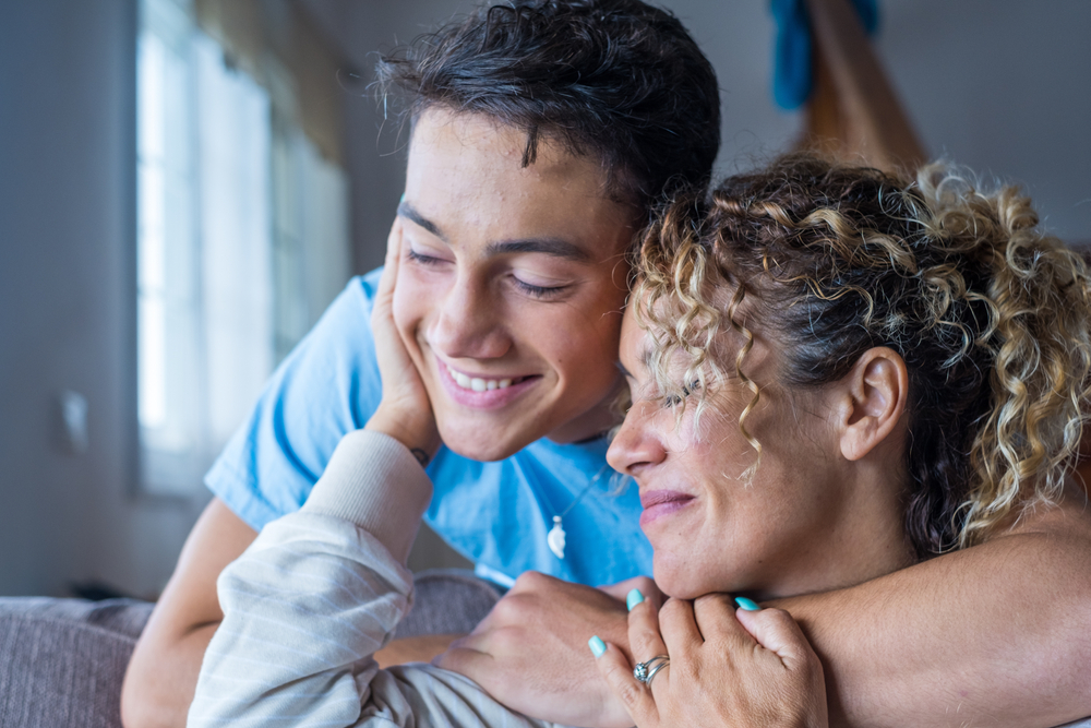 A middle age mother spends time with her teenage son