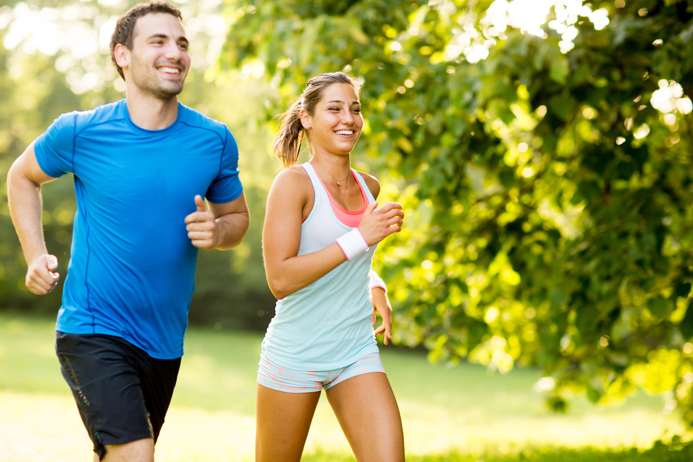 A young couple running. 