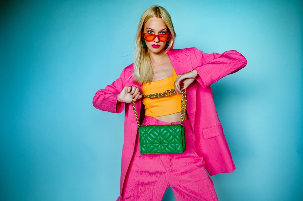 A young fashionable woman in colorful clothing.