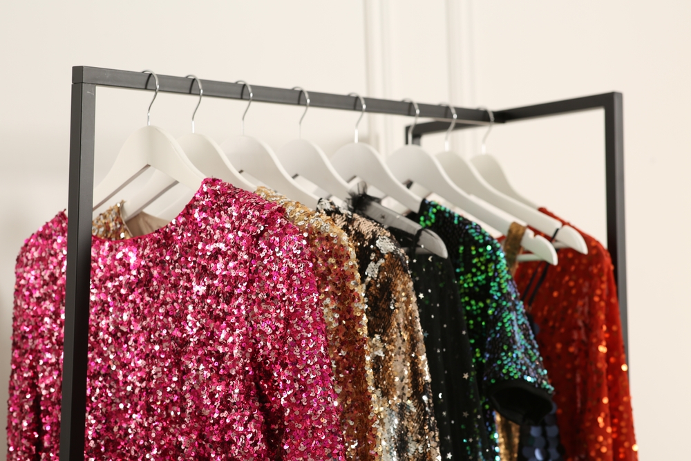Clothes hanging on hangers.