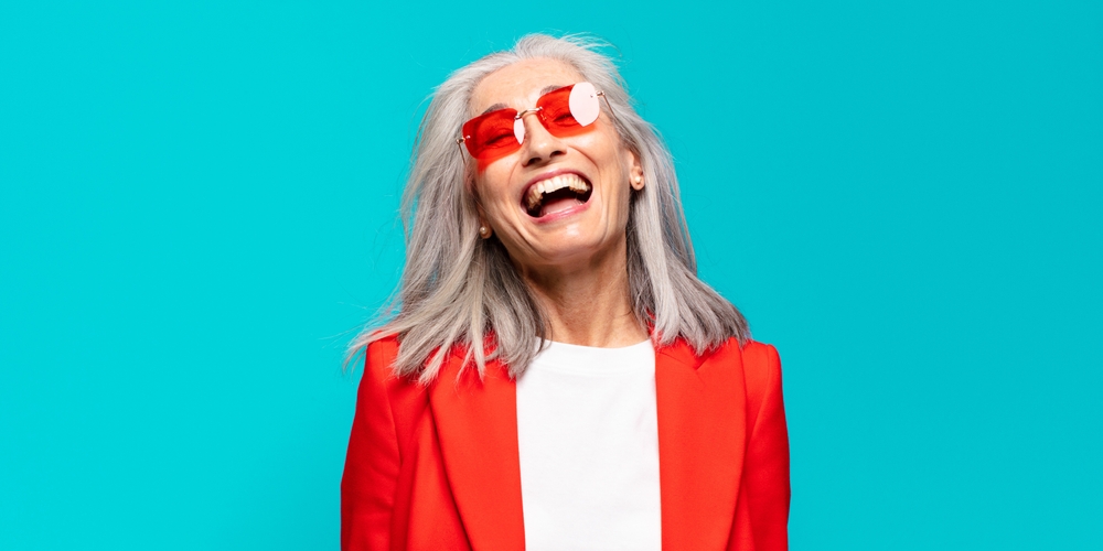 senior pretty woman laughing glasses