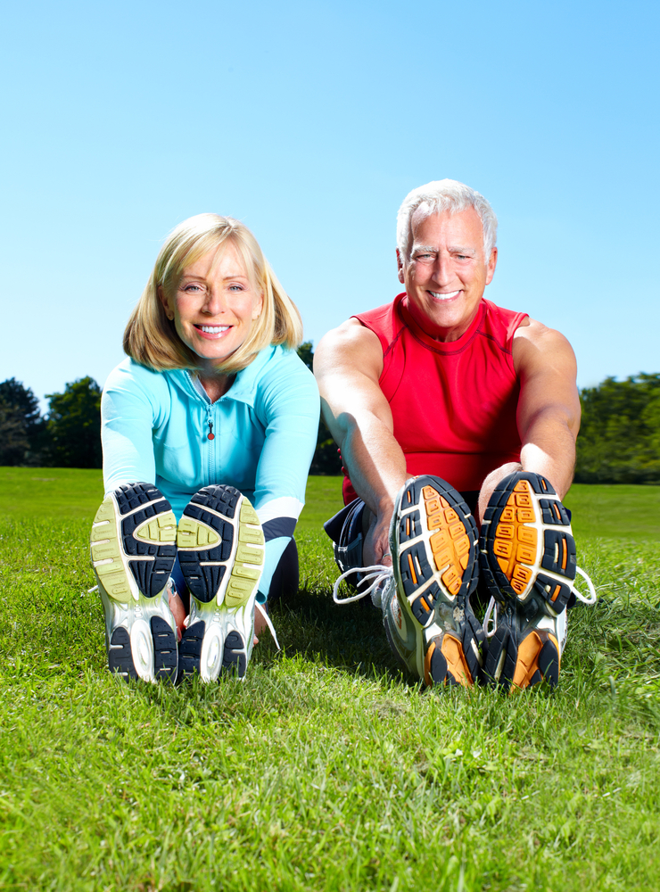 A senior healthy fitness couple wearing their fitness gear