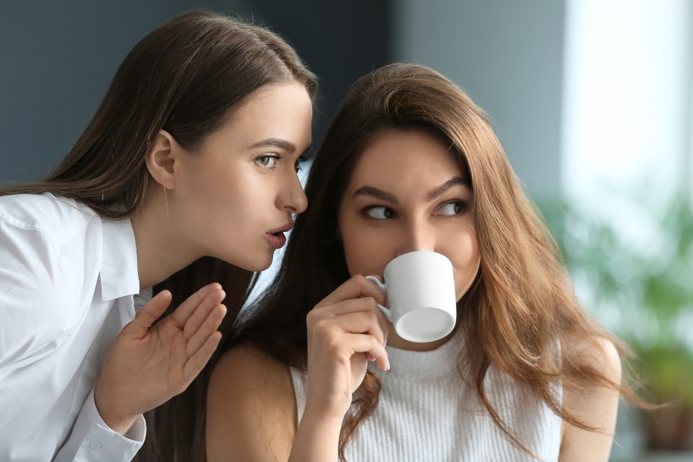 Female friends/colleagues gossiping