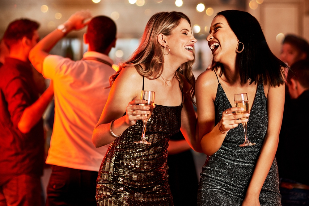 Women dancing and enjoying a party.