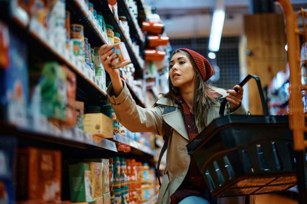 Young woman shopping for groceries.