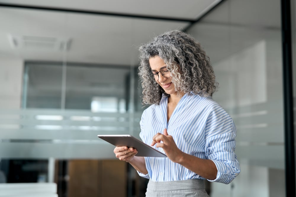 A busy confident elderly mature business woman