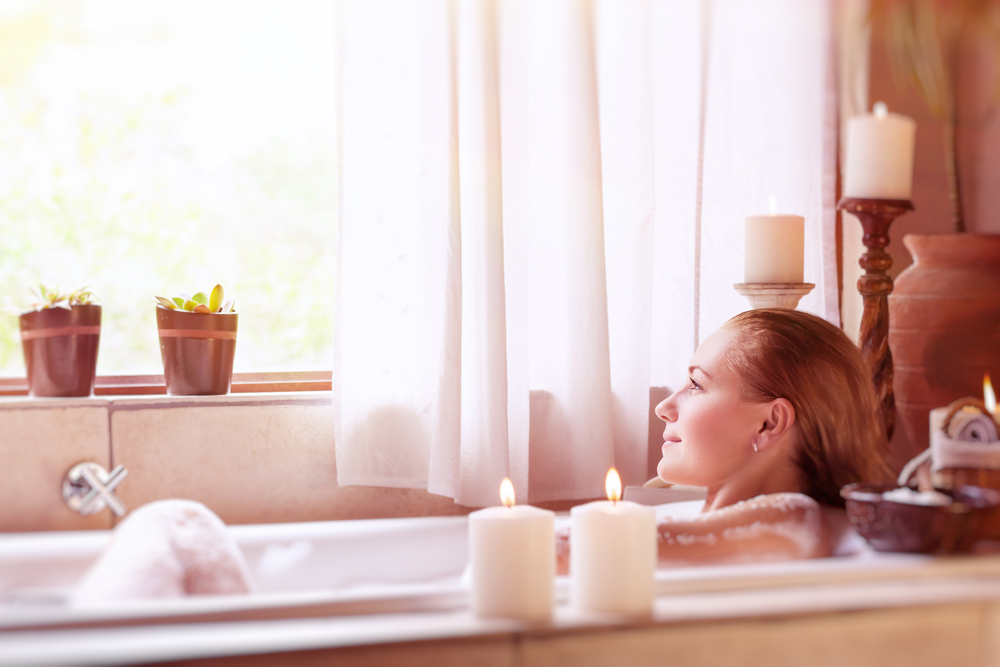 Woman in a hotel bath tub.