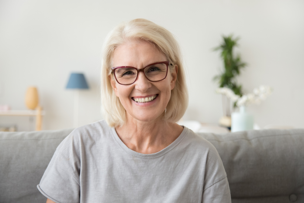 A smiling blond middle age mature woman