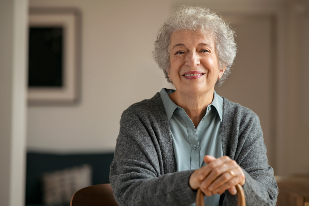 A smiling elderly senior woman and grandmother