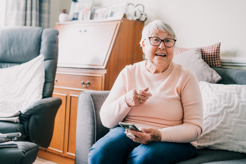 A happy, laughing senior woman