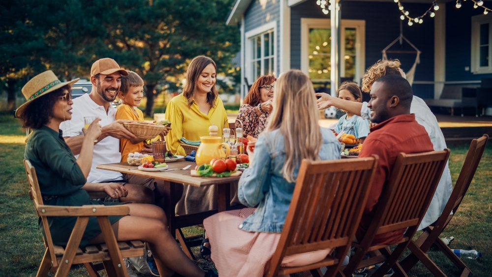 A happy family with parents, children and grandparents enjoying a family gathering
