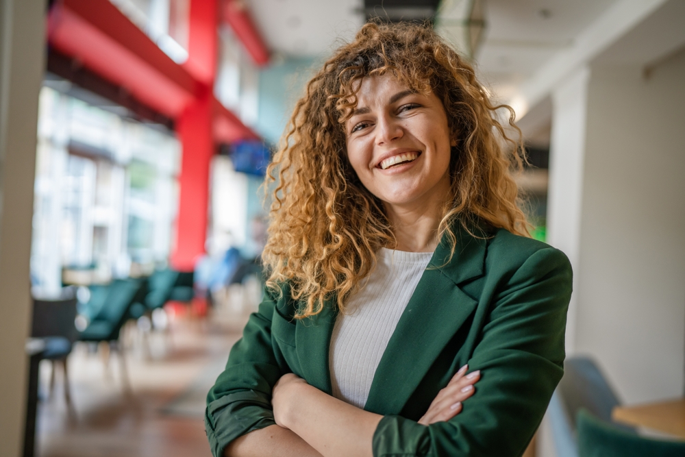 A very confident happy and smiling business woman