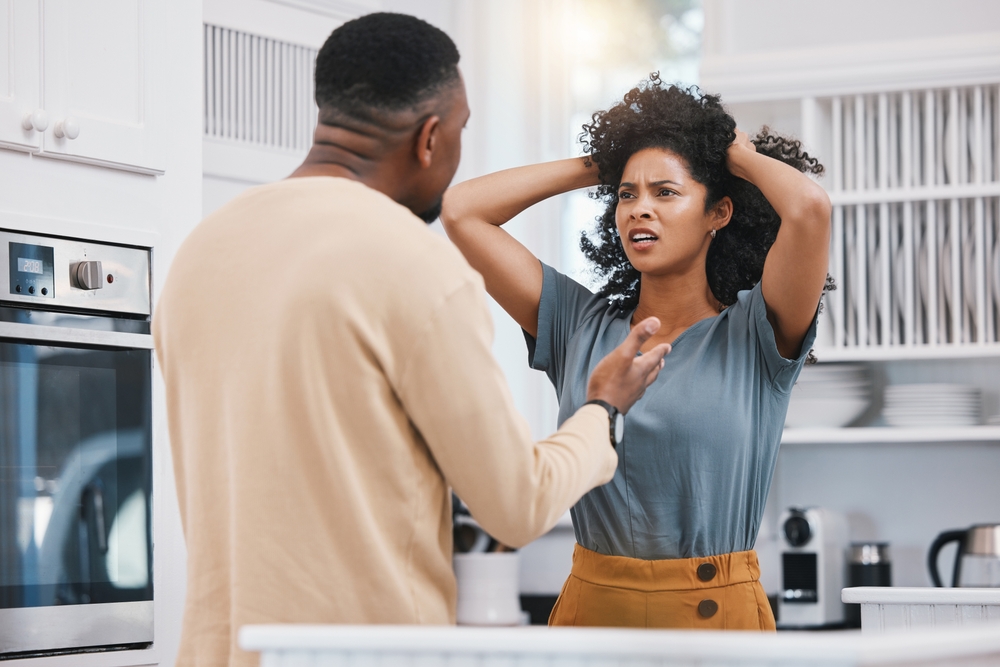Unhappy married couple fighting