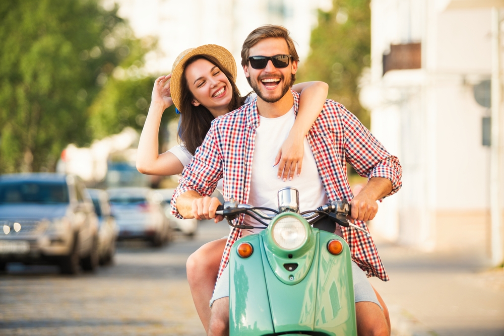 A couple in love riding a motorcycle
