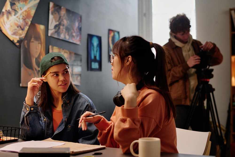 Two Asian women having a conversation