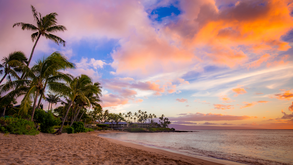 The sun over the ocean in Maui. 