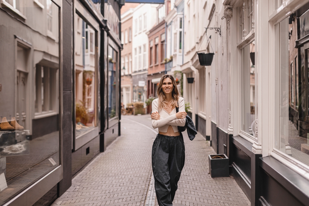 A radiant young woman walking