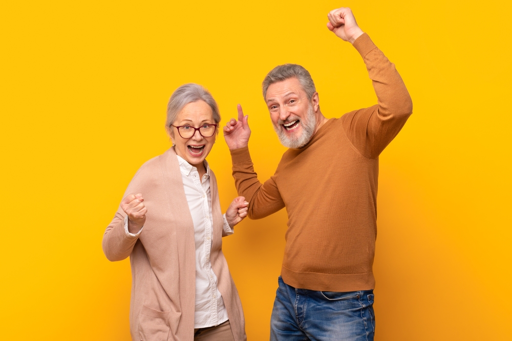 Happy senior couple dancing and having fun
