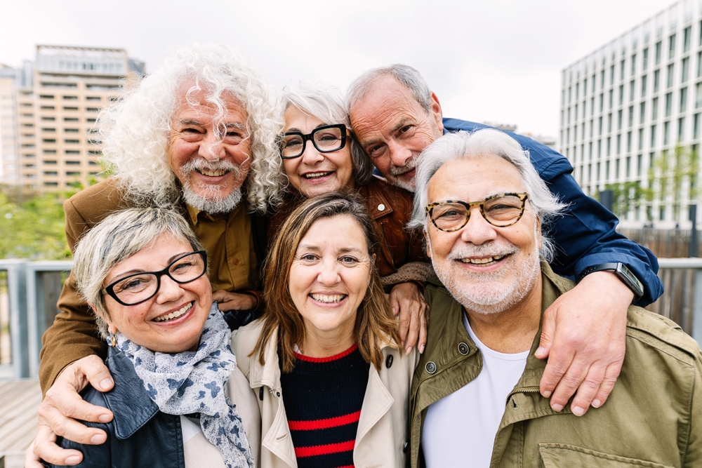 A group of happy mature senior friends having a day out together