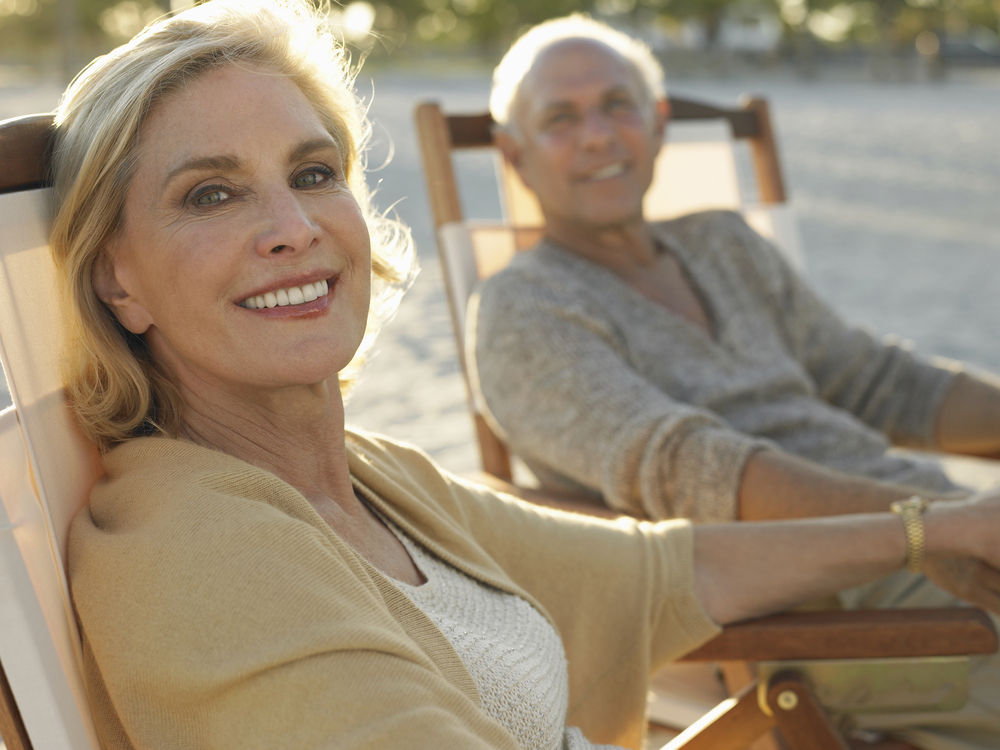 A happy middle age mature couple relaxing